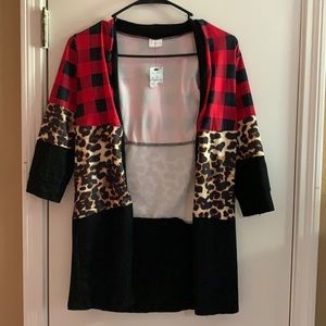 I am selling a multi printed over thin jacket size small